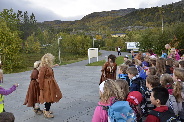 Children participating in the stone age educational program